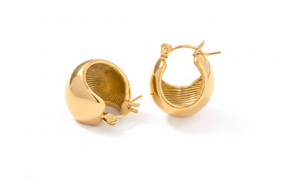 Gold hoop earrings with measurements on a white background